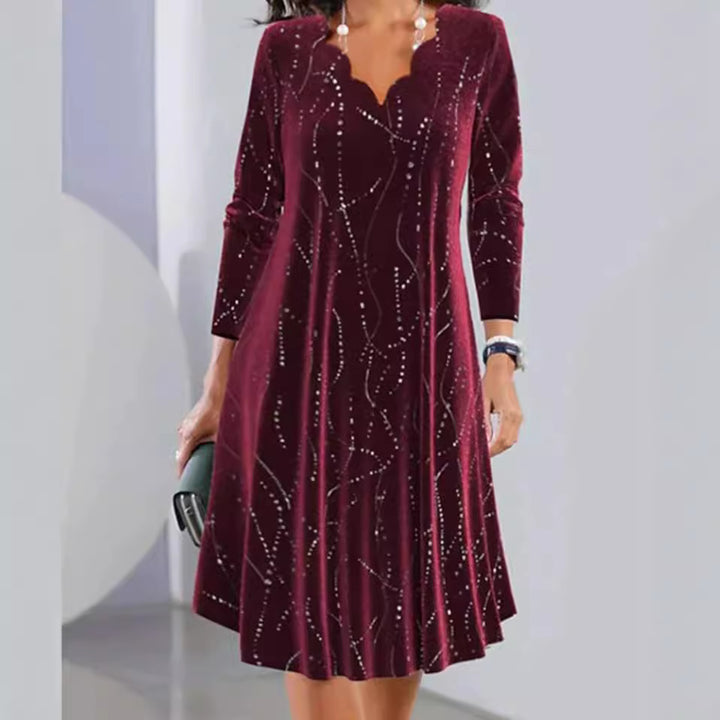 Women's satin A-line dress with curved neckline and rhinestone embellishment StylebySassy