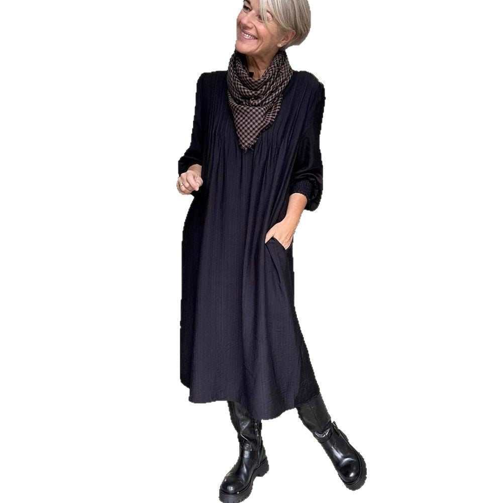 Ladies' loose midi dress with fine pleated look, stand-up collar, short button placket, smocked cuffs, and side pockets StylebySassy