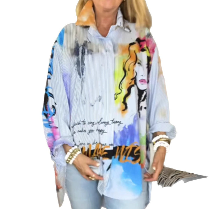 Ladies loose-fitting shirt blouse with artistic graffiti print, fine pinstripe texture and extended hem StylebySassy