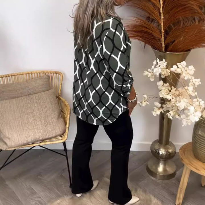 Ladies casual long tunic with V-neck three-quarter sleeves side pockets and geometric chain print StylebySassy