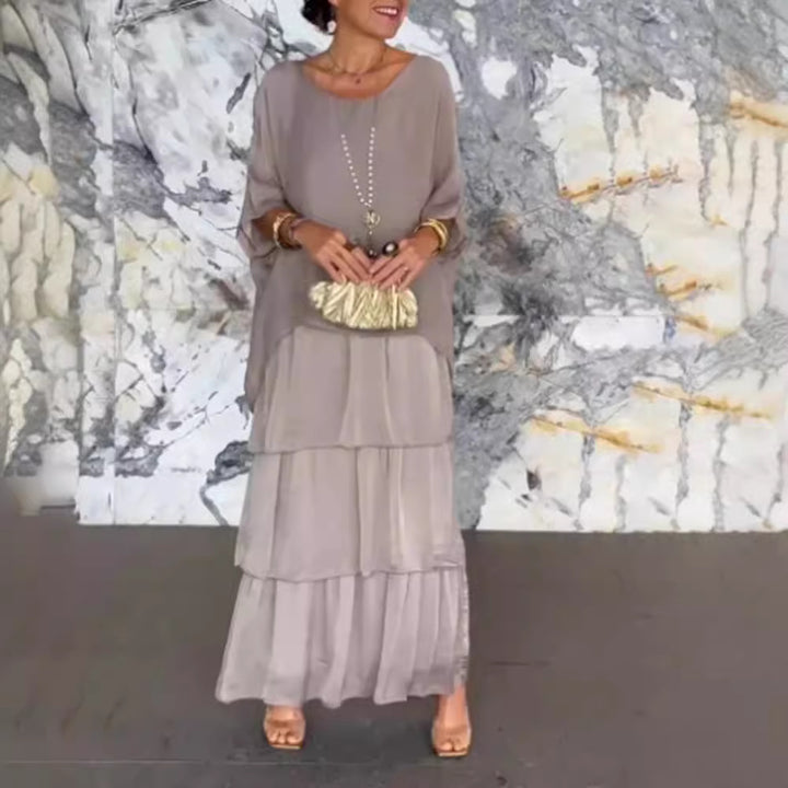 Women's layered tiered maxi dress with wide batwing top and tiered ruffle skirt StylebySassy