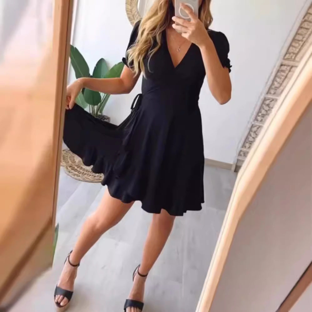 Women’s light wrap dress with V-neck, short sleeves, waist tie, and flounce skirt StylebySassy