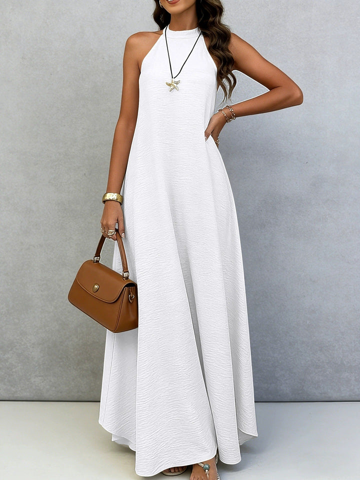 Women’s sleeveless maxi dress with high standing collar, flowing A-line and crepe texture StylebySassy