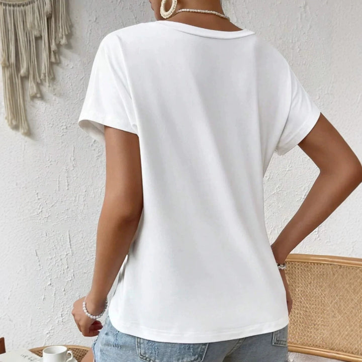 Women's asymmetrical knot shirt with side twist and elongated pointed hem StylebySassy