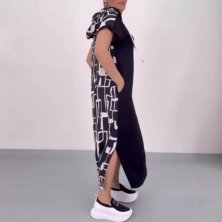Women's casual hooded kaftan dress in loose fit with short sleeve cut and abstract graphic pattern StylebySassy