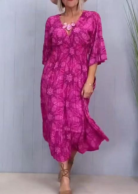 Women's flowing kaftan midi dress with V-neck, loose silhouette, tiered skirt, and three-quarter sleeves StylebySassy