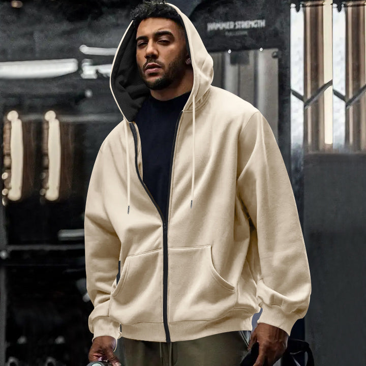 Men's oversized zip-up hoodie with kangaroo pockets and contrasting inner lining StylebySassy