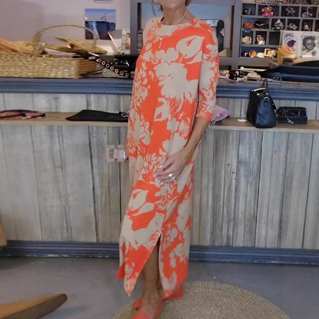 Women’s flowing A-line maxi dress with three-quarter sleeves round neckline side slit and inserted pockets StylebySassy