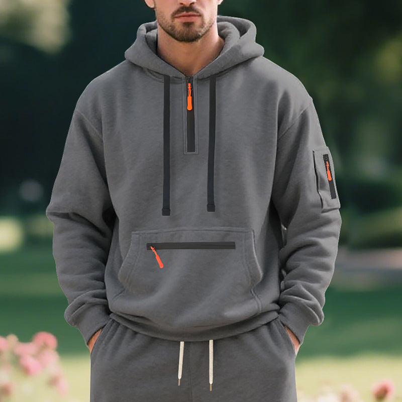 Men's half-zip hoodie with sealed zippers, kangaroo zip pocket, and arm pocket StylebySassy
