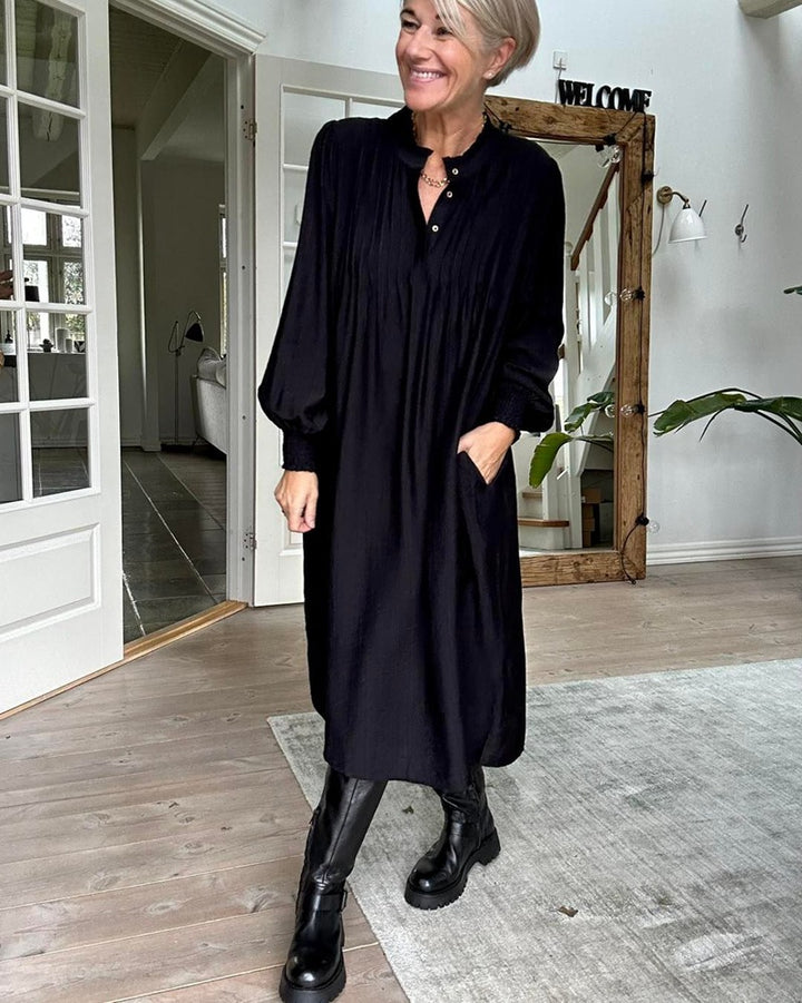 Ladies' loose midi dress with fine pleated look, stand-up collar, short button placket, smocked cuffs, and side pockets StylebySassy