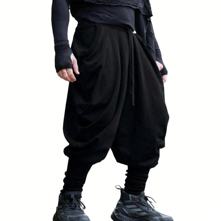 Men's avant-garde harem pants with wrap front, elastic waistband, and slim ankles StylebySassy