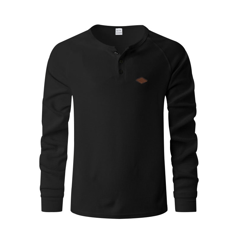 Men's structured long-sleeve shirt with short button placket, raglan sleeves, and subtle logo application StylebySassy