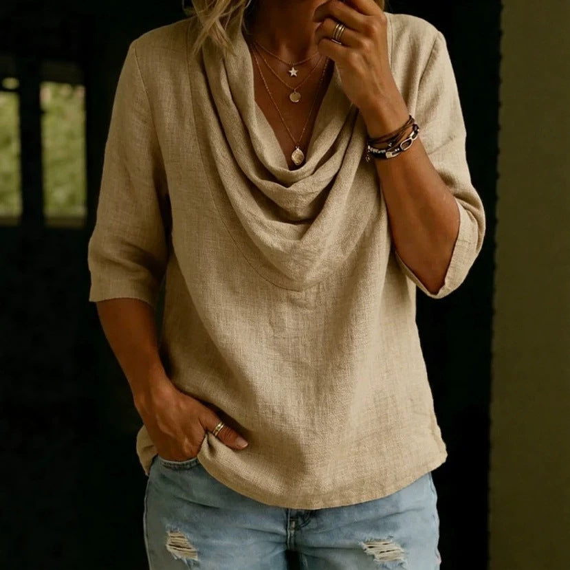 Women's airy linen blouse with draped waterfall collar, loose silhouette, and three-quarter sleeves StylebySassy