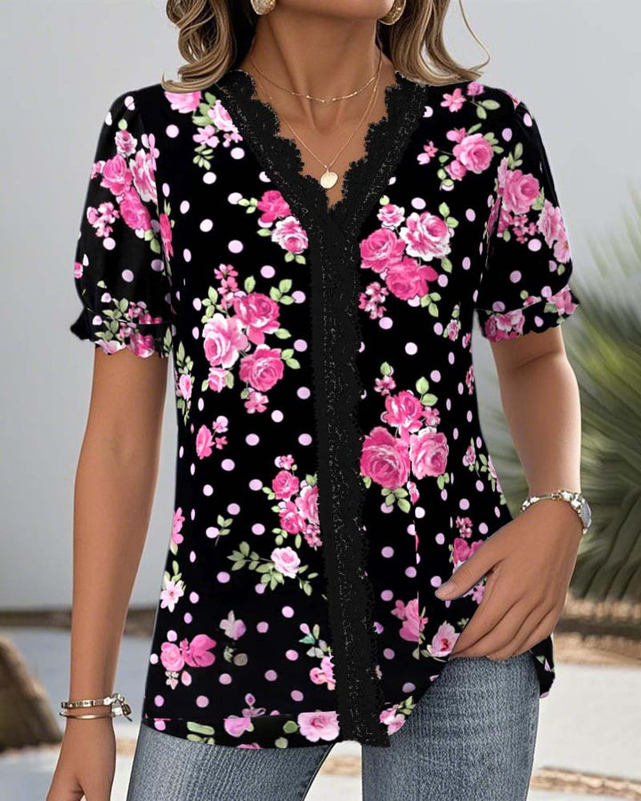 Ladies floral V-neck blouse with decorative lace trim and gathered short sleeves StylebySassy