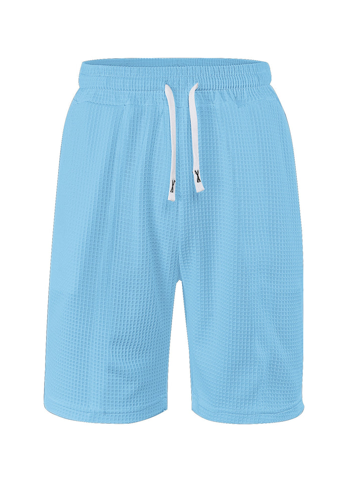 Men's breathable waffle pajama shorts with elastic comfort waistband, drawstring, and side pockets StylebySassy