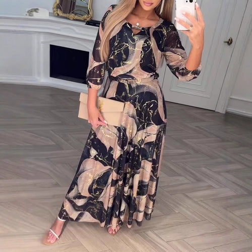 Women's floor-length chiffon dress with fitted tie belt, three-quarter sleeves and elegant watercolor print StylebySassy