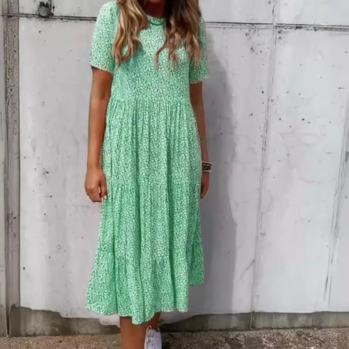 Women's light midi dress with gathered waist, short sleeves, and multilayered tiered skirt StylebySassy