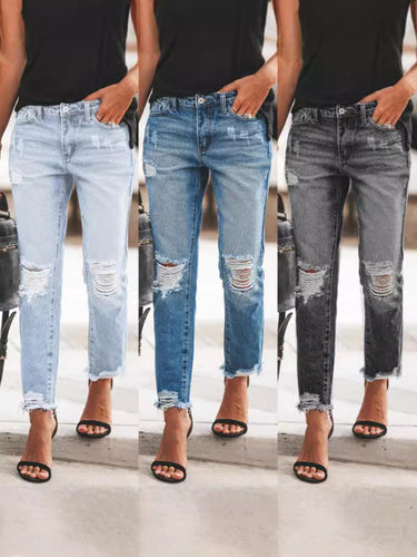 Ladies Ripped Denim Jeans with relaxed fit and frayed hem StylebySassy