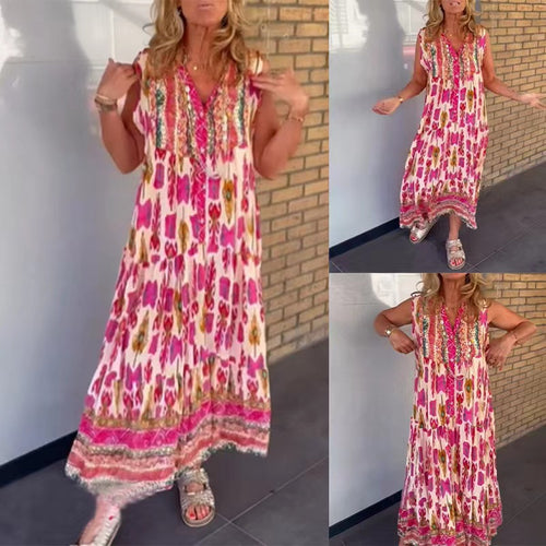 Ladies' flowing maxi dress in boho style with V-neck, tiered skirt and embroidered yoke StylebySassy