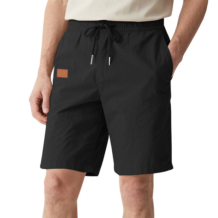 Men's quick-drying swim shorts in Bermuda cut with elastic waistband and drawstring StylebySassy
