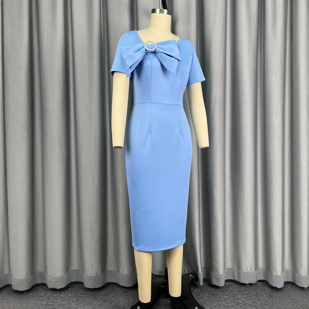 Women's fitted dress with large bow accent