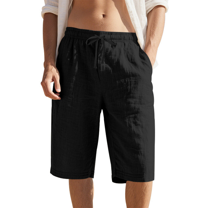 Men's knee-length Bermuda shorts made of crinkled muslin with elastic tunnel drawstring waistband and side pockets StylebySassy