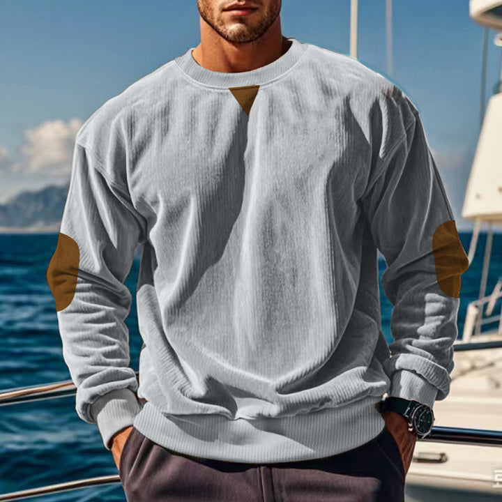 Men's ribbed knit sweater with round neckline elbow patches and decorative triangle StylebySassy
