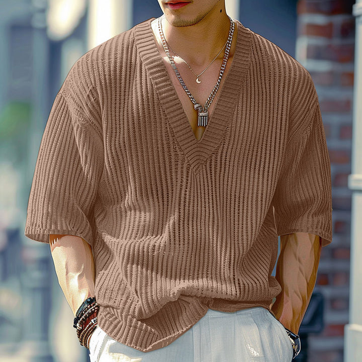 Women's oversized V-neck knit top with textured ribbed look and half-length sleeves StylebySassy