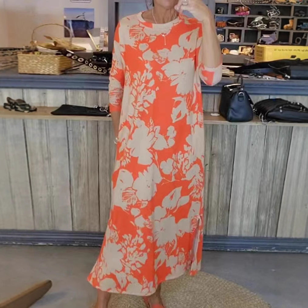 Women’s flowing A-line maxi dress with three-quarter sleeves round neckline side slit and inserted pockets StylebySassy