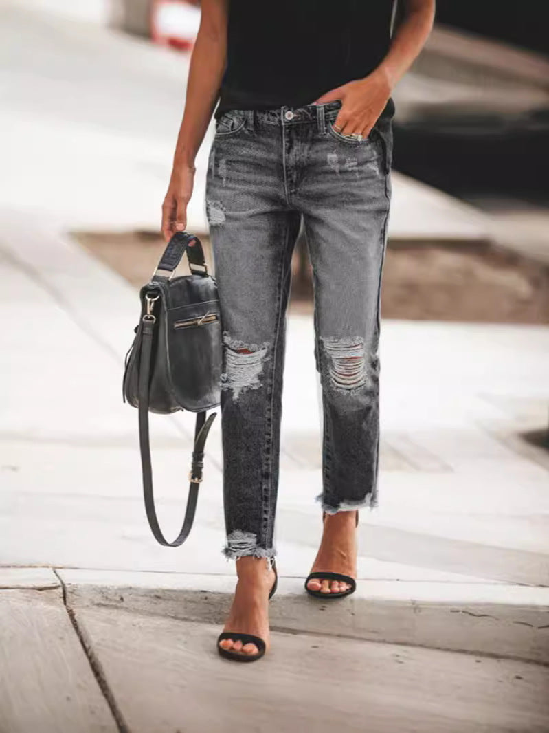 Ladies Ripped Denim Jeans with relaxed fit and frayed hem StylebySassy