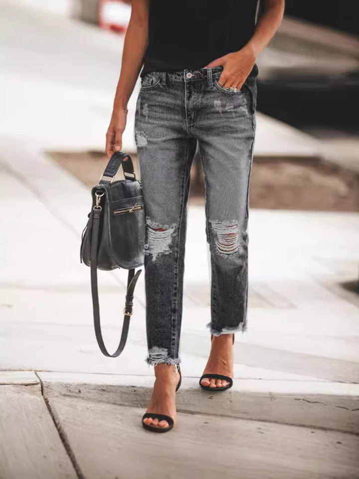 Ladies Ripped Denim Jeans with relaxed fit and frayed hem StylebySassy