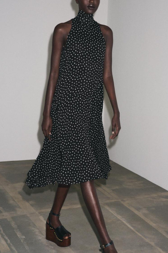 Women's sleeveless midi dress with high stand-up collar, flared ruffle skirt and polka dot pattern StylebySassy