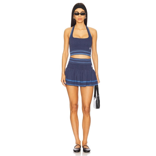 Women's knitted two-piece set with narrow straps, fitted crop top and pleated mini skirt in tennis style StylebySassy
