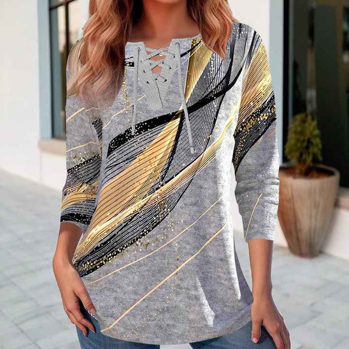 Women's long shirt with lace-up collar, three-quarter sleeves, and graphic metallic print StylebySassy