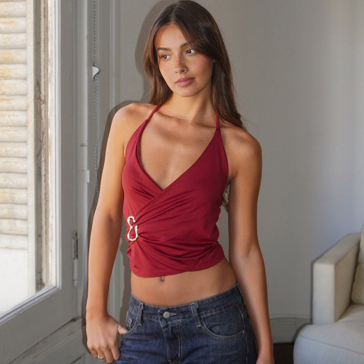 Ladies stylish wrap top with decorative buckle accent StylebySassy