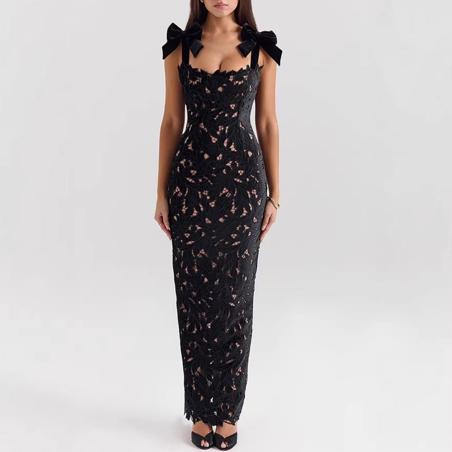 Women's form-fitting floor-length lace evening dress in column shape with decorative bow straps StylebySassy