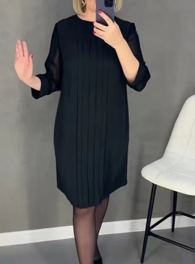 Ladies nan pleated sheath dress with knee-length silhouette and transparent three-quarter sleeves StylebySassy