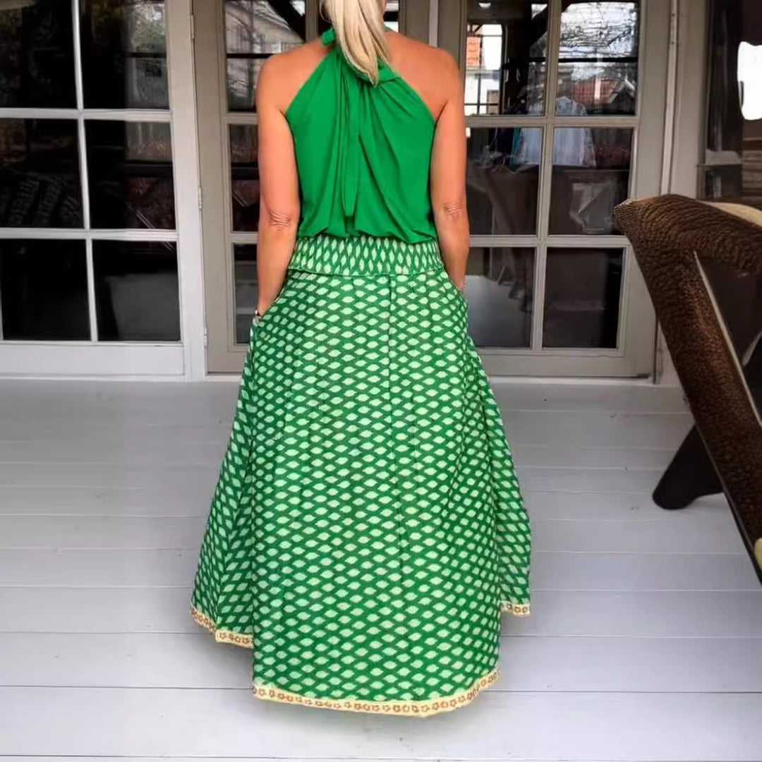 Women's two-piece halter neck set with gathered stand collar and patterned maxi skirt with elastic smocked waistband StylebySassy