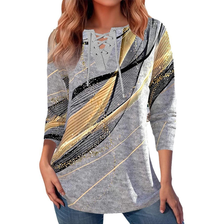 Women's long shirt with lace-up collar, three-quarter sleeves, and graphic metallic print StylebySassy