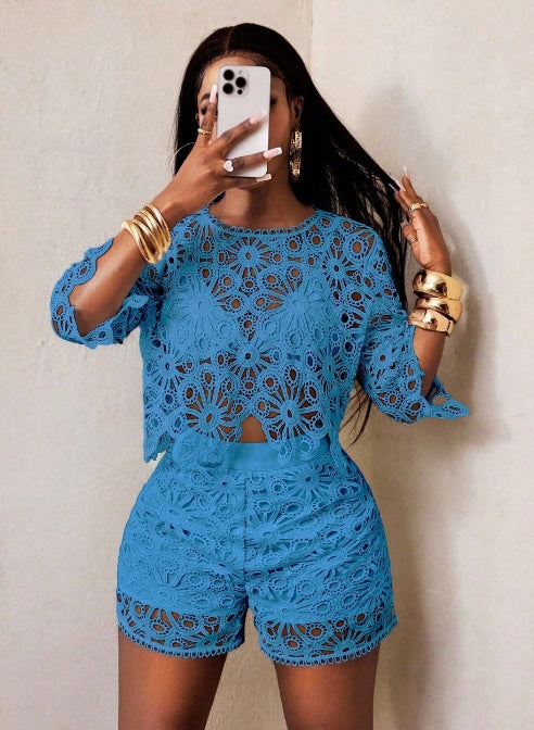 Women's airy crochet two-piece set with floral lace, short top and high-waisted tailored pants StylebySassy