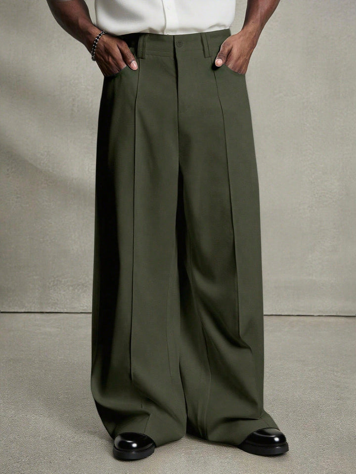 Men's wide pleated pants with high waistband, precise creases, and side inset pockets StylebySassy