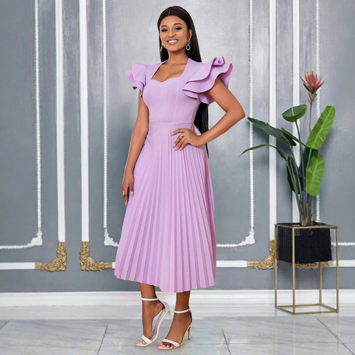 Women's pleated maxi dress with elegant ruffle details StylebySassy