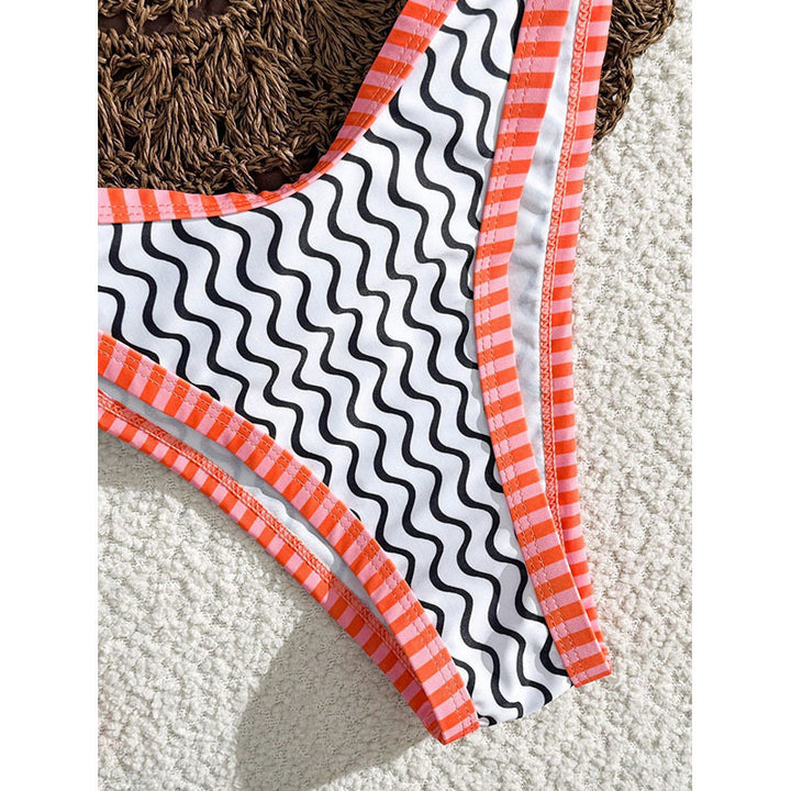 Women's bikini set with textured wave pattern and sporty strap design StylebySassy