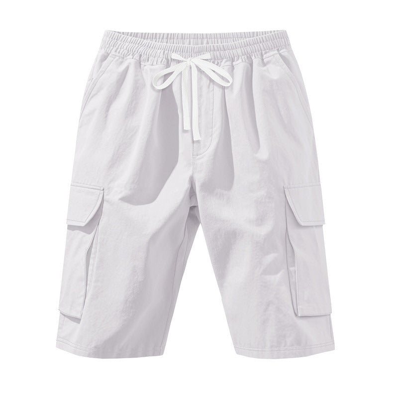Men's knee-length utility shorts made of lightweight cotton blend with elastic drawstring waistband and patch flap pockets StylebySassy