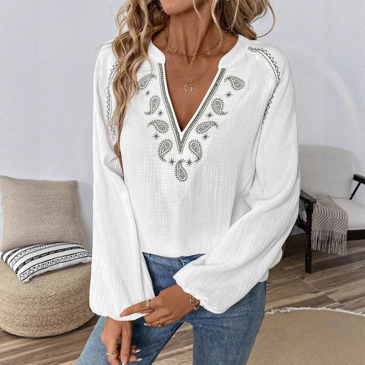 Women's embroidered cotton gauze tunic blouse with ornamental V-neck embroidery and trumpet sleeves StylebySassy