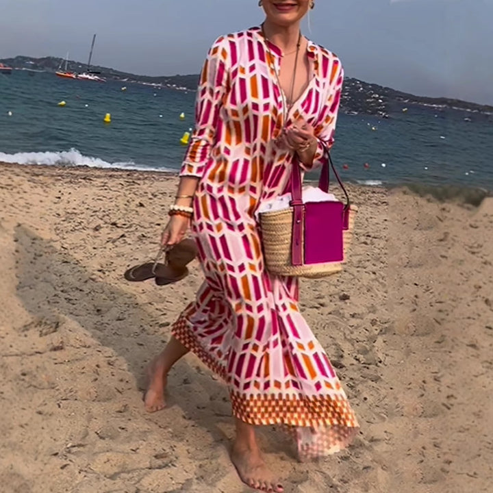 Women's flowing maxi dress with graphic all-over print, V-neck and three-quarter sleeves StylebySassy