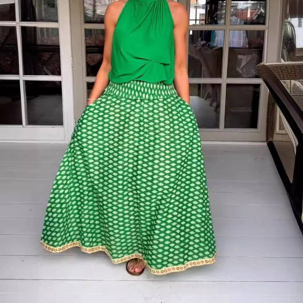Women's two-piece halter neck set with gathered stand collar and patterned maxi skirt with elastic smocked waistband StylebySassy