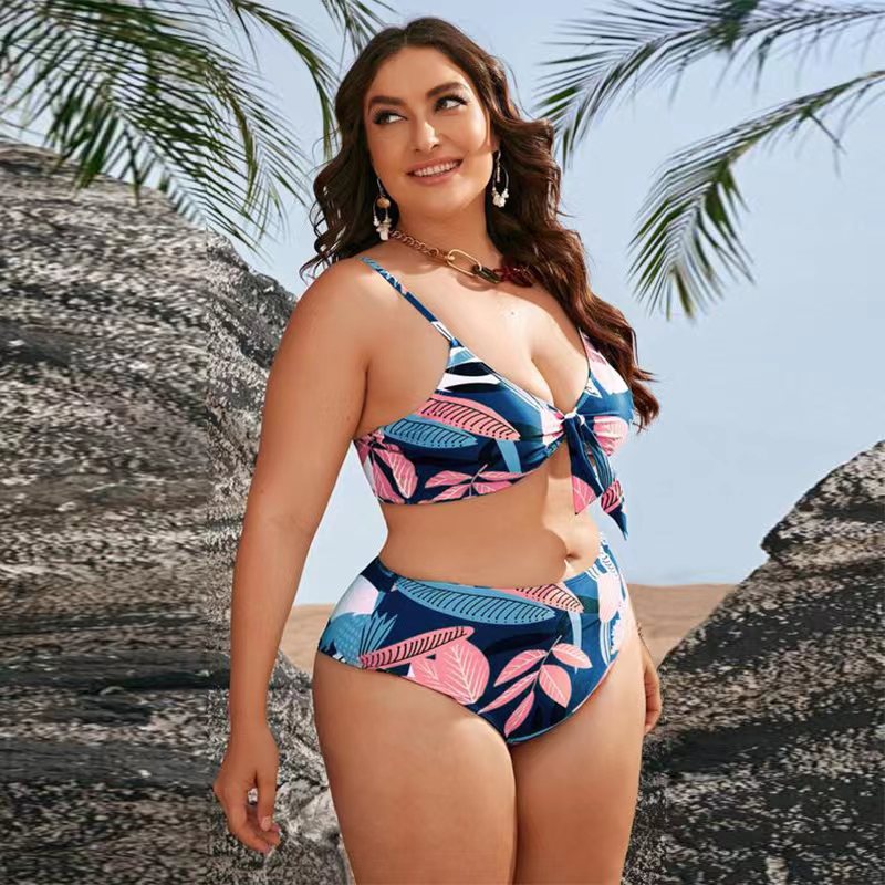 Women's bikini set with floral wrap top and elegant beach jacket StylebySassy