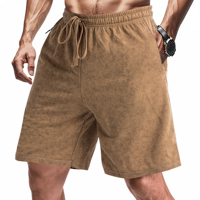 Men's lightly fitted terry shorts with elastic waistband, drawstring and side pockets StylebySassy