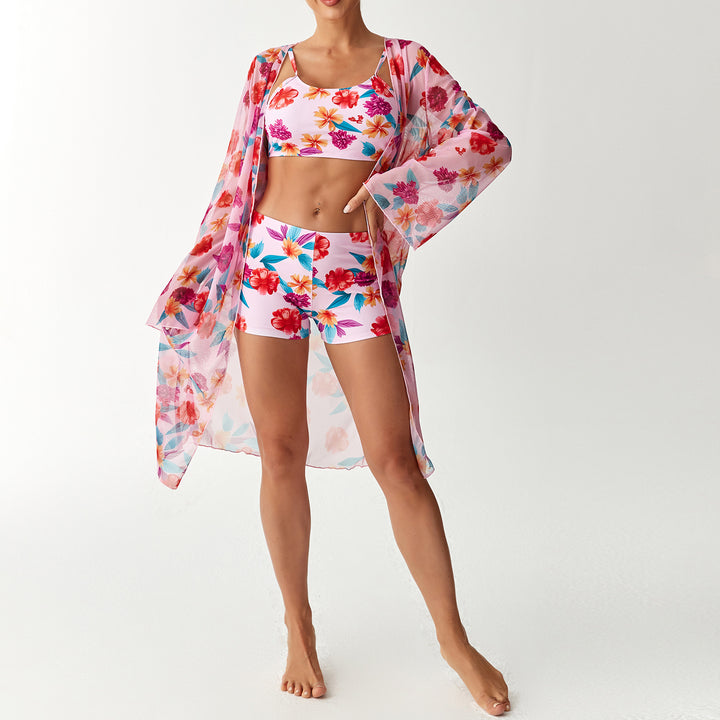Women's beach outfit with floral design and transparent kaftan StylebySassy